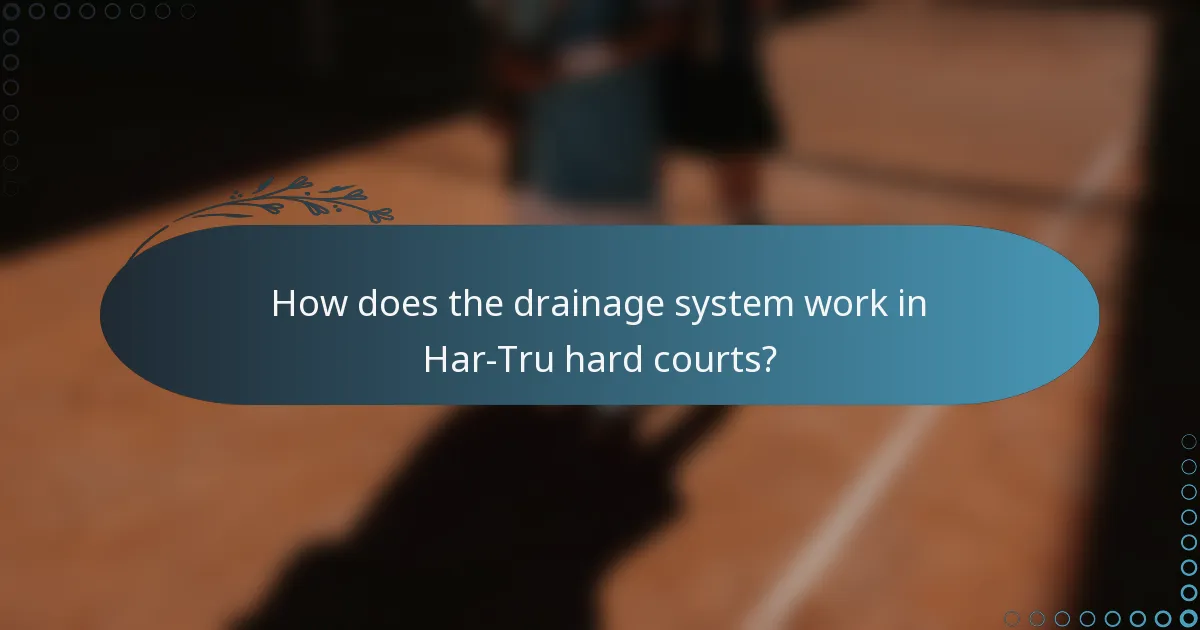 How does the drainage system work in Har-Tru hard courts?