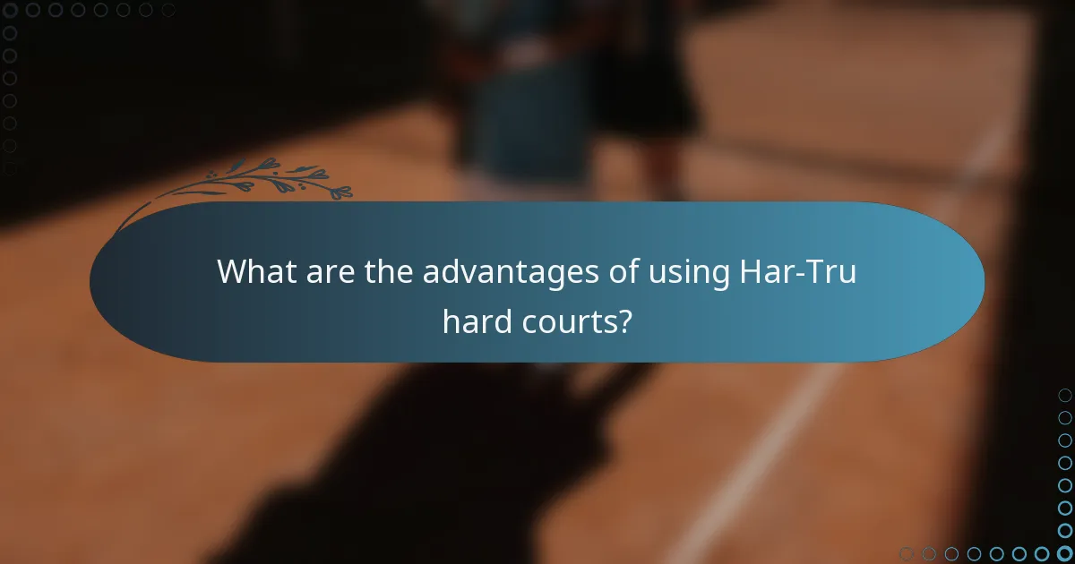 What are the advantages of using Har-Tru hard courts?